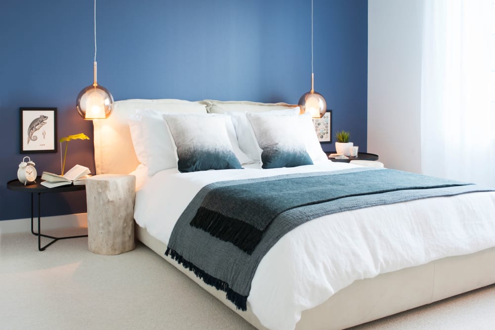 Bedroom with blue wall at YOO on the Park in Atlanta, Georgia