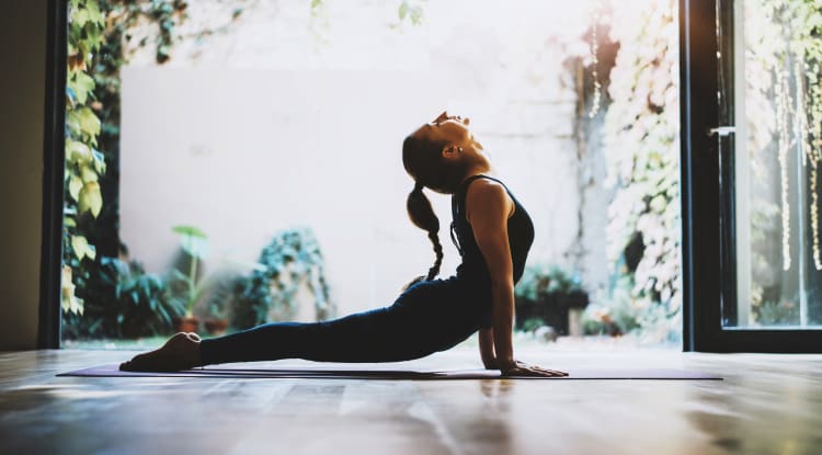 Woman doing yoga at YOO on the Park in Atlanta, Georgia