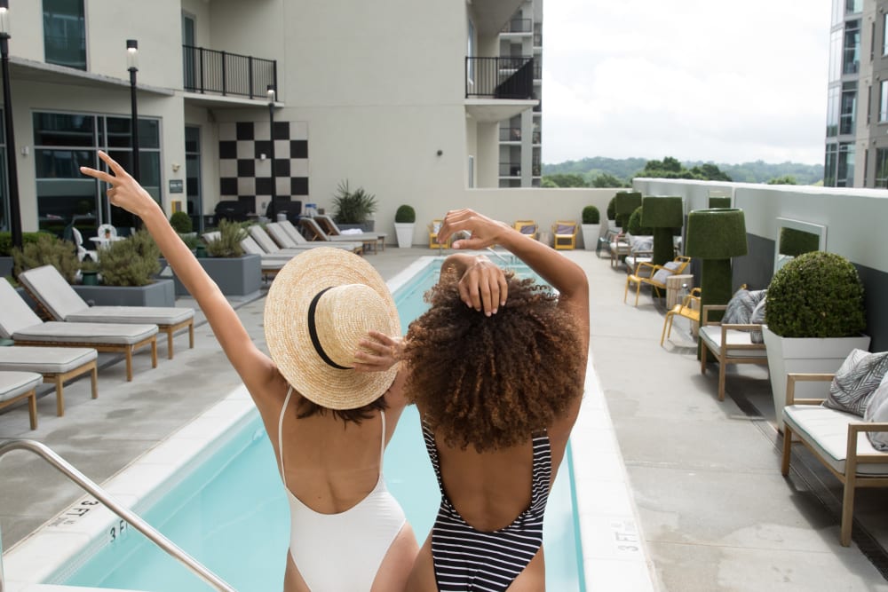 Two women at the pool at YOO on the Park in Atlanta, Georgia
